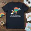 Be the Rainbow In Someone's Sky quote on a navy t-shirt with a rainbow hot air balloon graphic