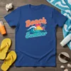Beach Summer t-shirt with a colorful ocean wave, palm tree, and sunset graphic