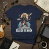 Bear on the Moon T-Shirt design featuring a brown bear in a leather jacket playing a guitar on the moon