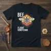 Bee Flight Honeycomb text with a stylized bee illustration on a dark t-shirt
