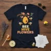 Bee Hive Flowers t-shirt design with cartoon bees, a honeycomb hive, and pink flowers on a dark background
