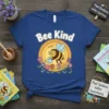 Bee Kind t-shirt design with a cute bee watering flowers and inspirational text