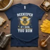 Navy blue t-shirt with "BEEKEEPER IF I RUN, YOU RUN" text and a bee graphic