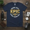 Being Epic Epic Every Damn Day quote on a navy t-shirt with gold text and a lion crest graphic