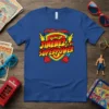 Bold superhero shield design with text "BEING A JIMENEZ IS MY SUPERPOWER" in vibrant colors on a blue t-shirt