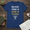 Believe There Is Good In The World quote on a navy t-shirt with a white tree graphic and birds