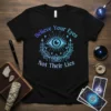 Believe Your Eyes Not Their Lies t-shirt with a blue and purple gradient mystical eye and pyramid graphic