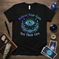 Believe Your Eyes Not Their Lies t-shirt with a blue and purple gradient mystical eye and pyramid graphic
