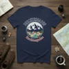 Navy t-shirt featuring a circular design with "Berchtesgaden" text, mountains, and a village scene. Includes the text "Berchtesgaden" twice