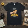 Best Cat Dad Ever t-shirt design with a cute orange tabby kitten held in a hand and starbursts
