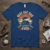 Best Cat Dad Ever quote with a cat on a throne, fish bones, and a crown, on a navy t-shirt