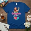 Best Daughter Ever quote in colorful typography with a girl graphic holding a heart key on a blue t-shirt