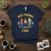 Best Friends Ever quote on a navy t-shirt featuring three diverse girls holding hands with dandelion graphics