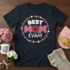 Best Mom Evah! text design with a rose and floral wreath on a navy t-shirt