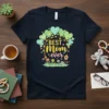 Best Mom Ever quote on a dark t-shirt with a tree graphic, heart-shaped leaves, and string lights