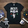 Best Mom Space Astronaut T-Shirt design with a mom and baby astronaut floating in space holding a moon balloon, surrounded