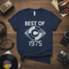 BEST OF 1975 text with a vintage vinyl record graphic on a navy blue t-shirt