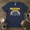 Besties I'll Be There For You T-Shirt with rainbow and stick figures, yellow text, white graphic, navy shirt