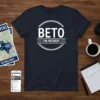 Navy blue t-shirt with white "BETO FOR PRESIDENT" text inside a circular emblem, designed for political campaigns