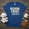 Bichon Frise Mama t-shirt with cream text and paw print graphics on a royal blue shirt, featuring a cute Bichon