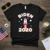 Biden 2020 t-shirt design with a pink and white rocket launching with stars and planets, black background