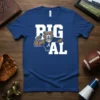 Big AL mascot flexing muscles with "BIG AL" text on a blue t-shirt, representing the University of Alabama