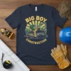 Big Boy Construction text with bulldozer graphic on a navy t-shirt, designed for kids