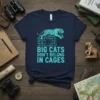 Navy blue t-shirt with turquoise text "BIG CATS DON'T BELONG IN CAGES" and a graphic of a tiger jumping over