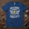 Big League Accuracy Nobody's Better quote on a navy blue t-shirt with trophy and wings graphic
