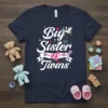 Big Sister of Twins T-Shirt design with stork, hearts, and baby rattles, announcing new siblings