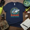 Bimini Shark Diving t-shirt design featuring a shark graphic and colorful circular waves