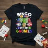 Black t-shirt with "BINGO WITH MY GNOMIES" text and three cute gnomes playing bingo, featuring bingo cards and balls