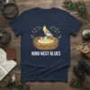 Bird Nest Blues t-shirt design with a cockatiel on a nest of eggs and chicks