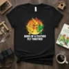 Birds Of A Feather Fly Together quote with colorful lovebirds graphic on a black t-shirt