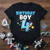 Birthday Boy 4 T-Shirt with blue text, large number 4, and a rocket in a starry space background