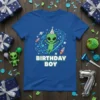 Blue t-shirt with "Birthday Boy" text and a cartoon alien wearing a party hat, surrounded by planets and rockets