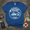 Birthday Cruise Crew text with a cruise ship, palm trees, and sun graphic on a royal blue t-shirt