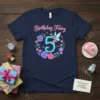 Birthday Fairy 5 T-Shirt design featuring a fairy on the number 5, surrounded by flowers and butterflies. Pink text reads