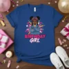 Birthday Girl text on a royal blue t-shirt featuring a cartoon girl in a denim jacket and pink bandana