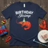Birthday Shrimp T-Shirt with a cute cartoon shrimp wearing a party hat and colorful confetti