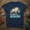 Navy blue t-shirt featuring a running bison graphic with the word "BISON" in light blue text