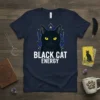 Black cat with yellow eyes and geometric design saying "BLACK CAT ENERGY" on a navy t-shirt
