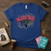 Black Girl Magic text with African map silhouette and colorful sparkles on a royal blue t-shirt