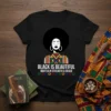 Black t-shirt with "BLACK IS BEAUTIFUL ROOTED IN STRENGTH & GRACE" text and a woman's silhouette with afro hairstyle