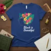 Black is Beautiful t-shirt with a profile of a woman with flowers in her hair
