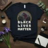 Black Lives Matter t-shirt with a raised fist graphic and city skyline, highlighting social justice and equality