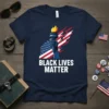 Black Lives Matter t-shirt design with a hand holding a torch, American flag background, and bold white text