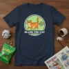 Navy t-shirt with a cartoon orange cat farting and the words "Blame The Cat"