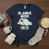 Blankie Mode On T-Shirt with a cute graphic of a person sleeping under a blanket and a toggle switch indicating