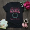 Blessed Mama My Greatest Adventure text with floral MAMA and laurel wreath graphic on black t-shirt